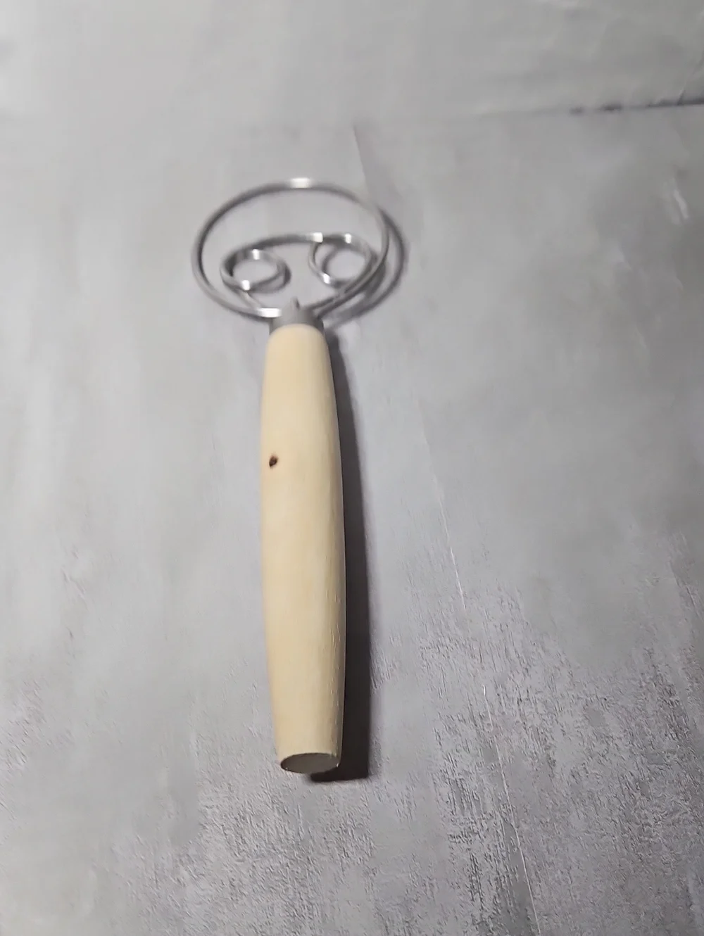 Danish dough whisk, commonly used for mixing heavy bread doughs